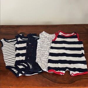 (5) Sleeveless bodysuits - 6 months